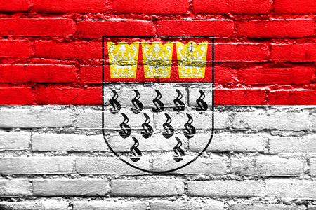 Flag of Cologne, Germany, painted on brick wallの写真素材