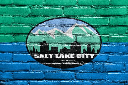 Flag of Salt Lake City, Utah, USA, painted on brick wallの写真素材