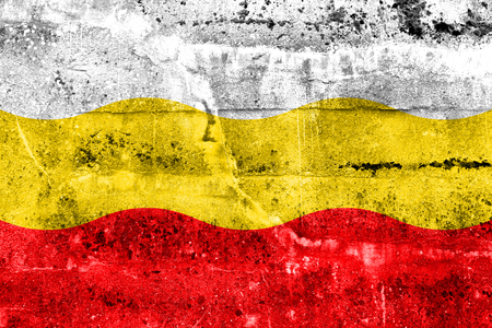 Flag of Decin, Czechia, painted on dirty wallの写真素材