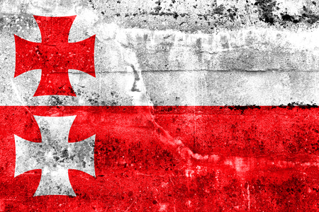 Flag of Elblag, Poland, painted on dirty wallの写真素材