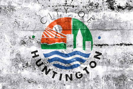 Flag of Huntington, West Virginia, USA, painted on dirty wallの写真素材