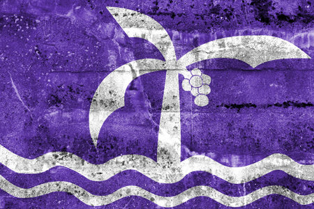 Flag of Macae, Brazil, painted on dirty wallの写真素材