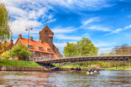 HAARLEM, NETHERLANDS - APR 30, 2017 : Canal with boats in Spring. Typical Dutch architecture. View from the boat level.のeditorial素材