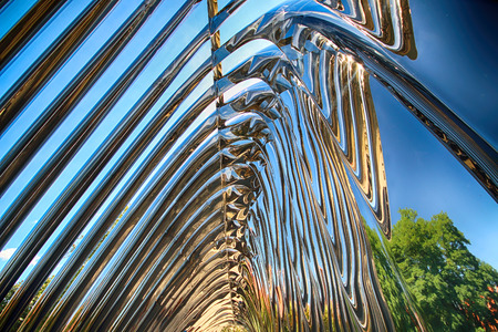 WROCLAW, POLAND - JULY 29, 2017: The NAWA sculpture designed by Oskar Zieta, erected on Daliowa Island. Due to polished steel surface NAWA reflects its surroundings (different feeling every time).のeditorial素材