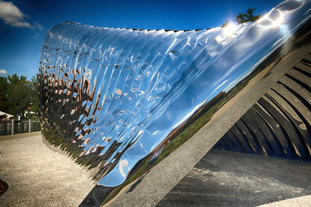 WROCLAW, POLAND - JULY 29, 2017: The NAWA sculpture designed by Oskar Zieta, erected on Daliowa Island. Due to polished steel surface NAWA reflects its surroundings (different feeling every time).のeditorial素材