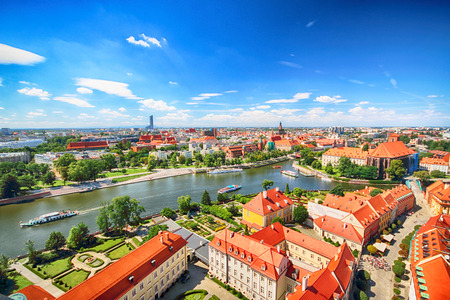 WROCLAW, POLAND - JULY 29, 2017: Aerial view of Wroclaw. Old Town and Cathedral Island (Ostrow Tumski) is the oldest part of the city. Odra River, boats and historic buildings on a summer day.のeditorial素材