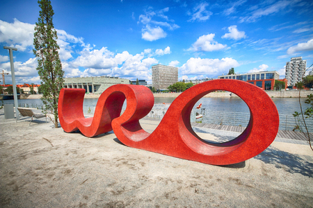 WROCLAW, POLAND - AUGUST 14, 2017: "WRO" sign on the boulevard nearby Grunwaldzki bridge. Wroclaw City Council announced the construction and 3 designs were put forward for the public to vote on.のeditorial素材