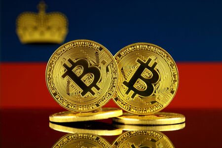 Physical version of Bitcoin and Lichtenstein Flag. Close up.の写真素材