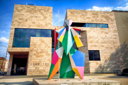 WROCLAW, POLAND - AUGUST 19, 2018: Capitol Music Theatre and a new Harlequin sculpture by Alessandro...