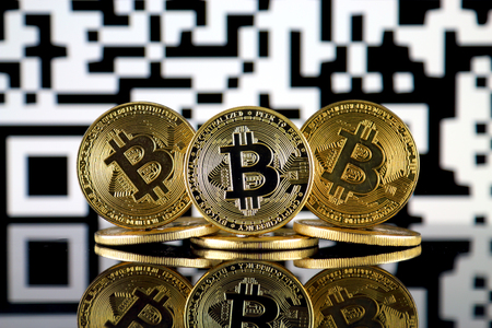 Bitcoin (BTC) and QR Code (Bitcoin Wallet Address) concept.の写真素材