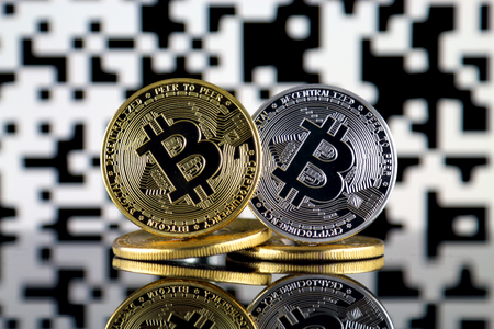 Bitcoin (BTC) and QR Code (Bitcoin Wallet Address) concept.の写真素材