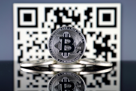 Bitcoin (BTC) and QR Code (Bitcoin Wallet Address) concept.の写真素材