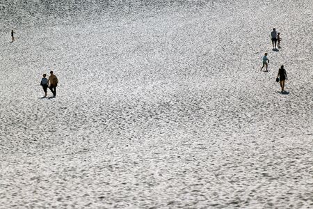 LEBA, POLAND - JULY 25, 2019: Slowinski National Park is situated on the Baltic Sea coast, near Leba, Poland. Desert landscape with the largest moving sand dunes in Europe. Hot day with clear sky.のeditorial素材