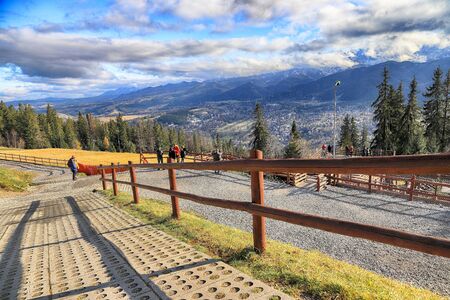 ZAKOPANE, POLAND - NOVEMBER 06, 2019: View of the city of Zakopane from Gubalowka, Poland, Europe. Gubalowka mountain is a popular tourist attraction, offering views of the Tatras and Zakopane.のeditorial素材