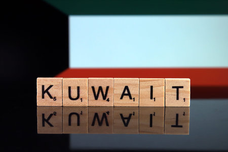 Kuwait Flag and country name made of small wooden letters. Studio shot.