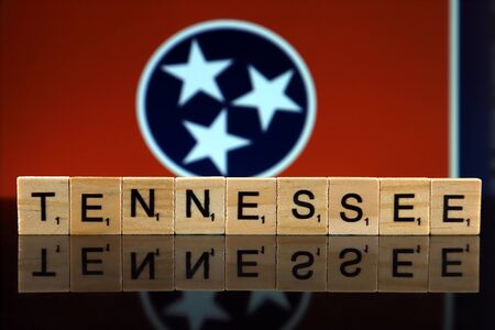 Tennessee State Flag and state name made of small wooden letters. Studio shot.の写真素材