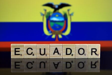 Ecuador Flag and country name made of small wooden letters. Studio shot.の写真素材