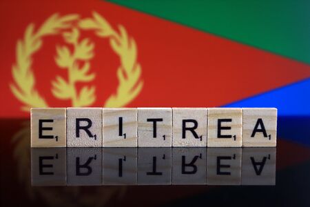 Eritrea Flag and country name made of small wooden letters. Studio shot.の写真素材