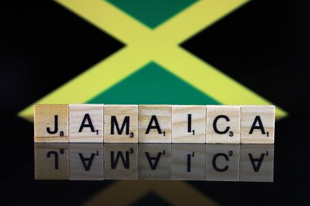 Jamaica Flag and country name made of small wooden letters. Studio shot.の写真素材