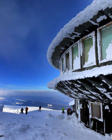 KARPACZ, POLAND - MARCH 08, 2020: A disc-shaped observatory with a weather station and restaurant was built in 1974, located on the peak of Sniezka mountain, Karkonosze National Park, Poland, Europe.のeditorial素材