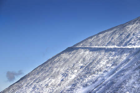 KARPACZ, POLAND - MARCH 08, 2020: Snezka or Sniezka (in Czech and Polish) is a mountain on the border between the Czech Republic and Poland, Karkonosze National Park, Poland, Europe.のeditorial素材