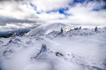 KARPACZ, POLAND - MARCH 08, 2020: Tourist trail to Sniezka (mountain on the border between the Czech...