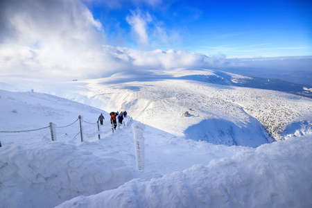 KARPACZ, POLAND - MARCH 08, 2020: Tourist trail to Sniezka (mountain on the border between the Czech Republic and Poland). Winter landscape. Giant Mountains, Poland, Europe.のeditorial素材