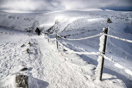 KARPACZ, POLAND - MARCH 08, 2020: Tourist trail to Sniezka (mountain on the border between the Czech Republic and Poland). Winter landscape. Giant Mountains, Poland, Europe.のeditorial素材