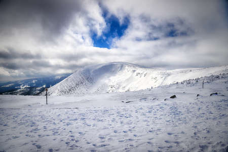 KARPACZ, POLAND - MARCH 08, 2020: Tourist trail to Sniezka (mountain on the border between the Czech Republic and Poland). Winter landscape. Giant Mountains, Poland, Europe.のeditorial素材