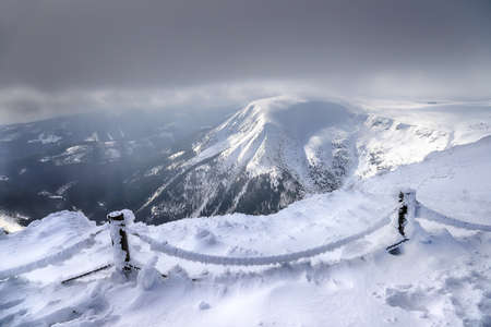 KARPACZ, POLAND - MARCH 08, 2020: Tourist trail to Sniezka (mountain on the border between the Czech Republic and Poland). Winter landscape. Giant Mountains, Poland, Europe.のeditorial素材