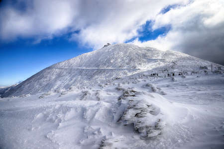 KARPACZ, POLAND - MARCH 08, 2020: Snezka or Sniezka (in Czech and Polish) is a mountain on the border between the Czech Republic and Poland, Karkonosze National Park, Poland, Europe.のeditorial素材