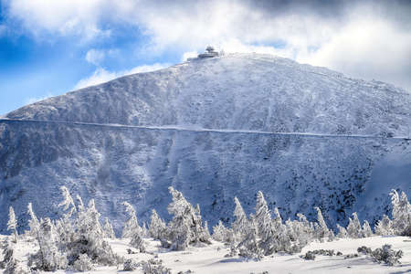 KARPACZ, POLAND - MARCH 08, 2020: Snezka or Sniezka (in Czech and Polish) is a mountain on the border between the Czech Republic and Poland, Karkonosze National Park, Poland, Europe.のeditorial素材