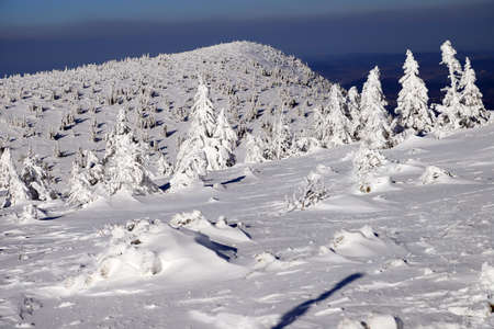 KARPACZ, POLAND - MARCH 08, 2020: Tourist trail to Sniezka (mountain on the border between the Czech Republic and Poland). Winter landscape. Giant Mountains, Poland, Europe.のeditorial素材