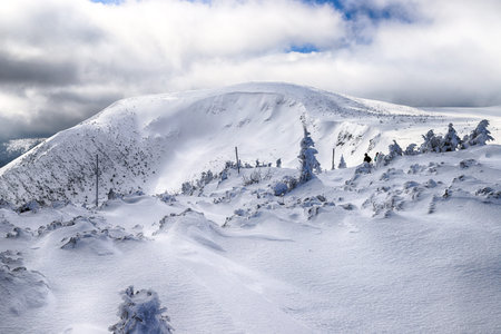 KARPACZ, POLAND - MARCH 08, 2020: Tourist trail to Sniezka (mountain on the border between the Czech...