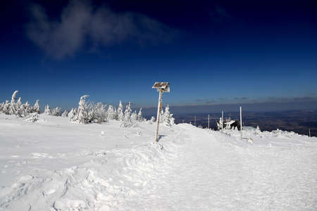 KARPACZ, POLAND - MARCH 08, 2020: Tourist trail to Sniezka (mountain on the border between the Czech Republic and Poland). Winter landscape. Giant Mountains, Poland, Europe.のeditorial素材