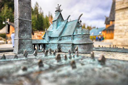 KARPACZ, POLAND - MARCH 09, 2020: Bronze miniature of the old wooden temple Vang (Wang). Medieval Norwegian stave church which was transferred from Vang in Norway to Karpacz, Poland, Europe.のeditorial素材