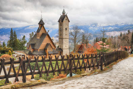 KARPACZ, POLAND - MARCH 09, 2020: Old wooden temple Vang (Wang). Medieval Norwegian stave church which was transferred from Vang in Norway and re-erected in 1842 in Karpacz, Poland, Europe.のeditorial素材
