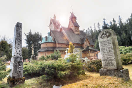 KARPACZ, POLAND - MARCH 09, 2020: Old wooden temple Vang (Wang). Medieval Norwegian stave church which was transferred from Vang in Norway and re-erected in 1842 in Karpacz, Poland, Europe.のeditorial素材