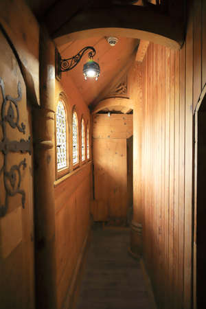 KARPACZ, POLAND - MARCH 09, 2020: Interior of the old wooden temple Vang (Wang). Medieval Norwegian stave church which was transferred from Vang in Norway to Karpacz, Poland, Europe.のeditorial素材