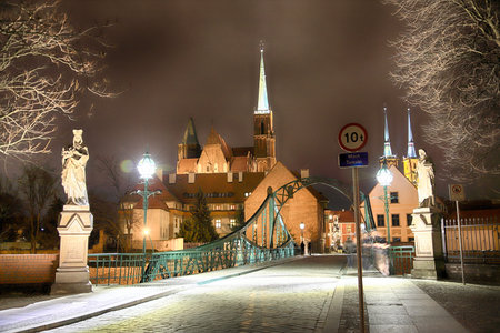 WROCLAW, POLAND - MARCH 10, 2020: Night view of the Tumski Bridge on Cathedral Island, oldest part...