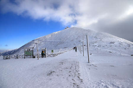 KARPACZ, POLAND - MARCH 08, 2020: Tourist trail to Sniezka (mountain on the border between the Czech Republic and Poland). Winter landscape. Giant Mountains, Poland, Europe.のeditorial素材