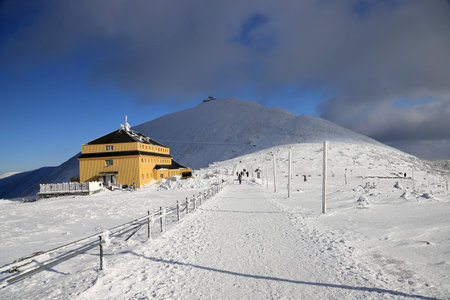KARPACZ, POLAND - MARCH 08, 2020: Sniezka - the view from Rownia pod Sniezka from mountain shelter...