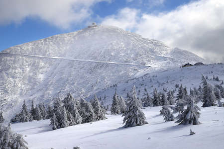 KARPACZ, POLAND - MARCH 08, 2020: Snezka or Sniezka (in Czech and Polish) is a mountain on the border between the Czech Republic and Poland. Winter landscape. Giant Mountains, Poland, Europe.のeditorial素材