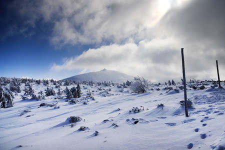 KARPACZ, POLAND - MARCH 08, 2020: Snezka or Sniezka (in Czech and Polish) is a mountain on the border between the Czech Republic and Poland. Winter landscape. Giant Mountains, Poland, Europe.のeditorial素材