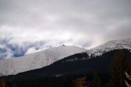 KARPACZ, POLAND - MARCH 08, 2020: Night view of the Giant Mountains with the highest peak - Sniezka (1602 m. above sea level). Winter landscape. Karpacz, Poland, Europe.のeditorial素材