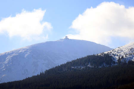 KARPACZ, POLAND - MARCH 08, 2020: View of the Giant Mountains with the highest peak - Sniezka (1602 m. above sea level). Winter landscape. Karpacz, Poland, Europe.のeditorial素材