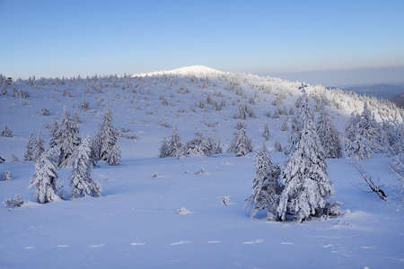 KARPACZ, POLAND - MARCH 08, 2020: Tourist trail to Sniezka (mountain on the border between the Czech Republic and Poland). Winter landscape. Giant Mountains, Poland, Europe.のeditorial素材