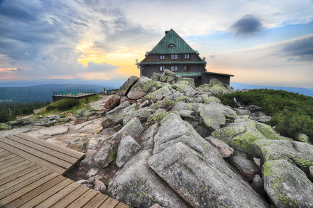 SZKLARSKA POREBA, POLAND - AUGUST 10, 2020: Szrenica mountain shelter (1362 m above sea level) during sunset, Szklarska Poreba, Poland, Europe.のeditorial素材