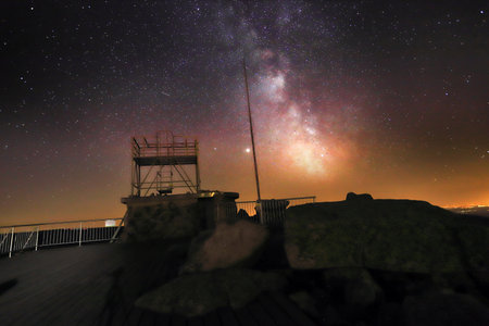 SZKLARSKA POREBA, POLAND - AUGUST 11, 2020: The Milky Way seen from the observation deck on Szrenica (1362 m above sea level), Szklarska Poreba, Poland, Europe.のeditorial素材
