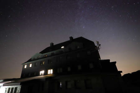 SZKLARSKA POREBA, POLAND - AUGUST 11, 2020: Night view on Szrenica mountain shelter (1362 m above sea level), Szklarska Poreba, Poland, Europe.のeditorial素材